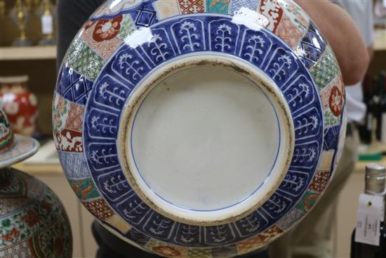 A Chinese lidded ceramic vase and a Japanese Imari ceramic bowl